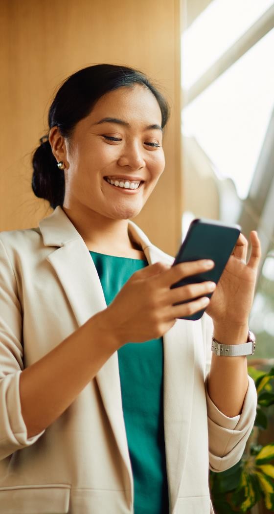 Person using a mobile phone, from the supplied Thermologix brochure